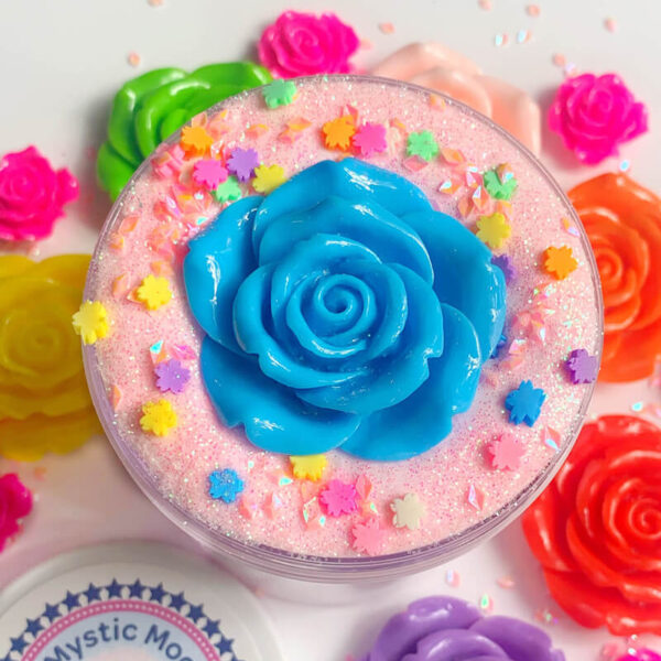 Moof’s Rose Garden is a super soft and fluffy pastel pink butter slime, scented like fresh-cut roses. The slime is topped with rose petal glitter, flower sprinkles, and comes with a beautiful rose charm.